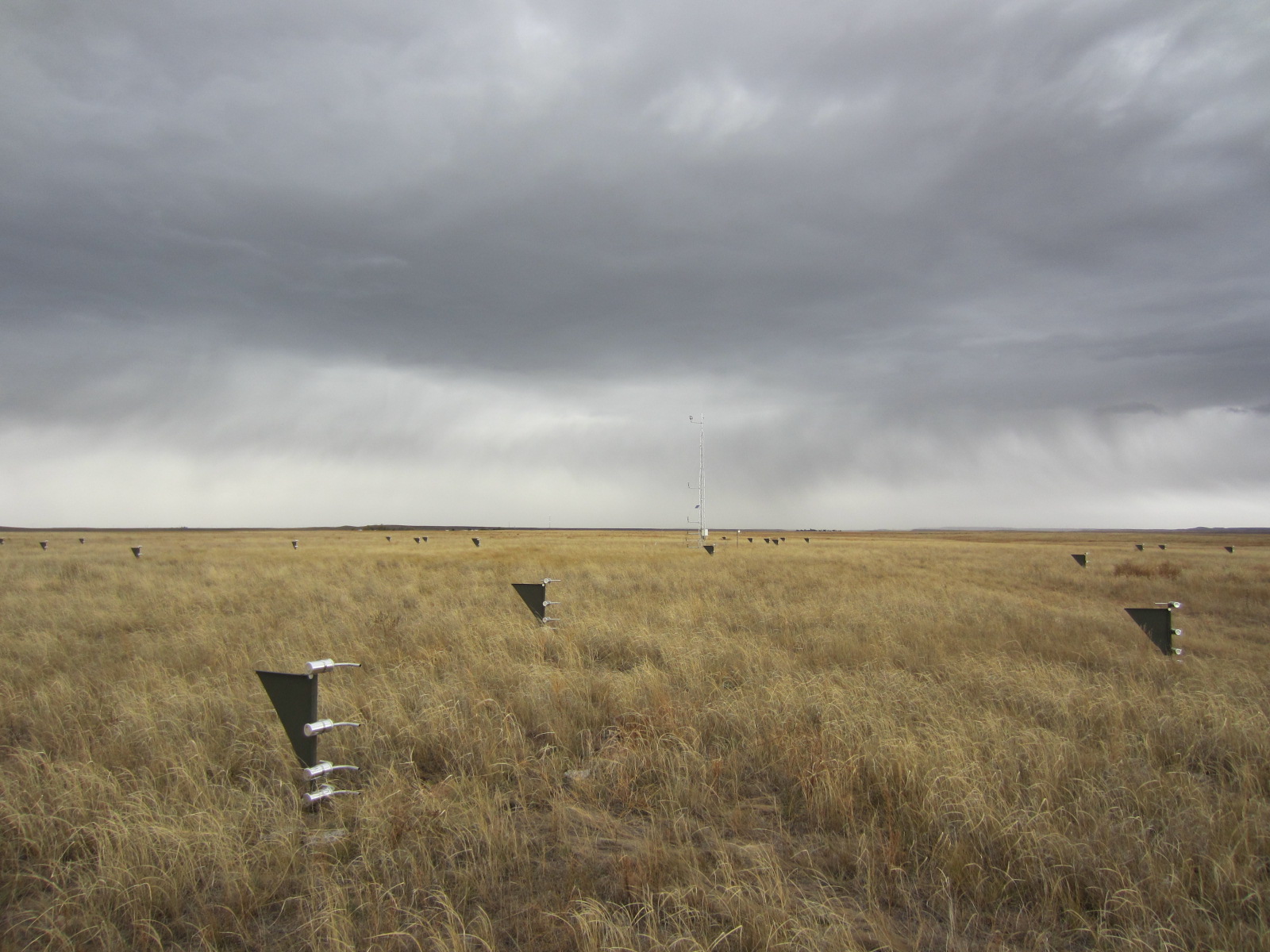 Photo of the Central Plains Experimental Range (LTAR) Network site showing MWAC sediment samplers and meteorological tower in the shortgrass steppe.